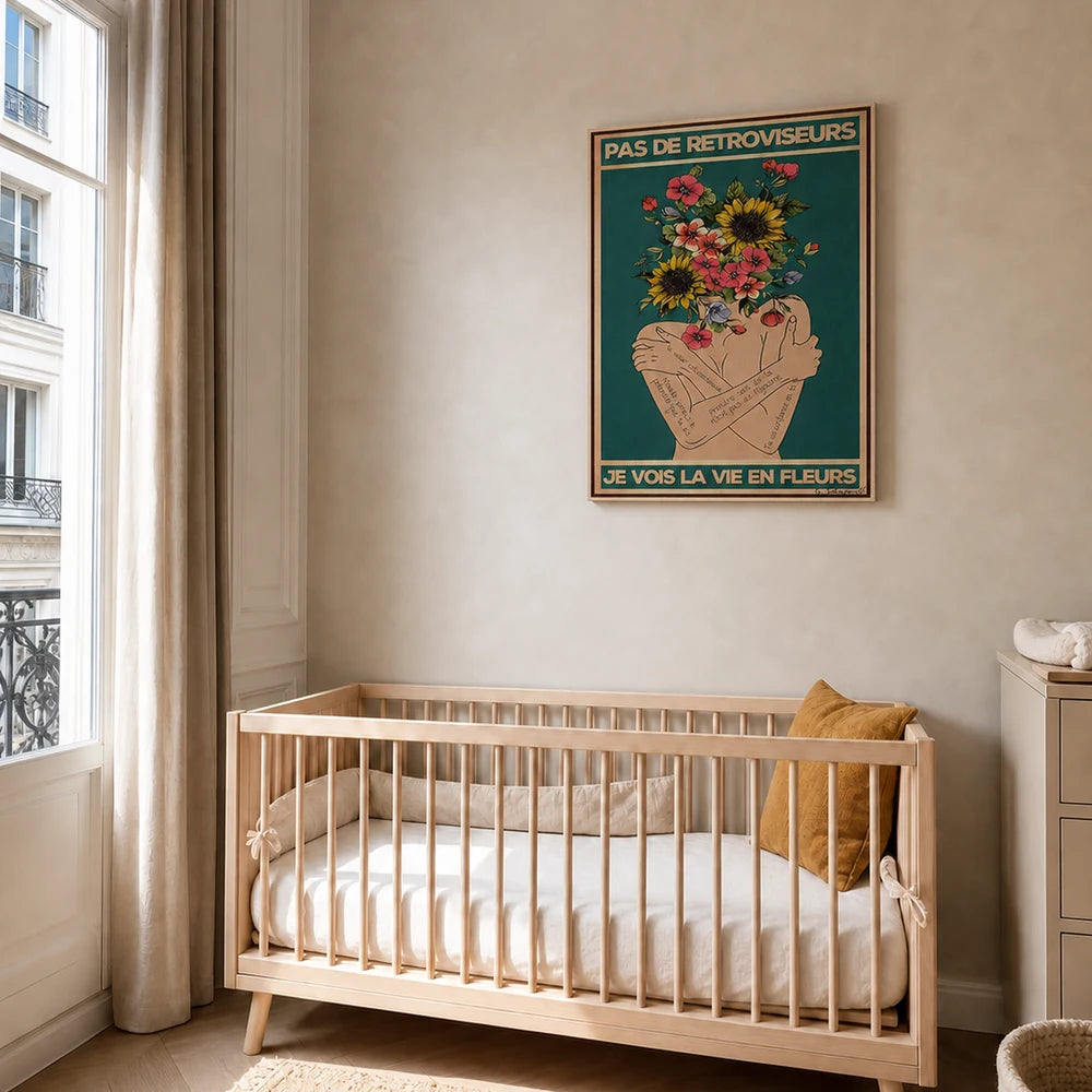 Mise en scène d’une chambre d’enfant avec la toile Pas de rétroviseurs, je vois la vie en fleurs