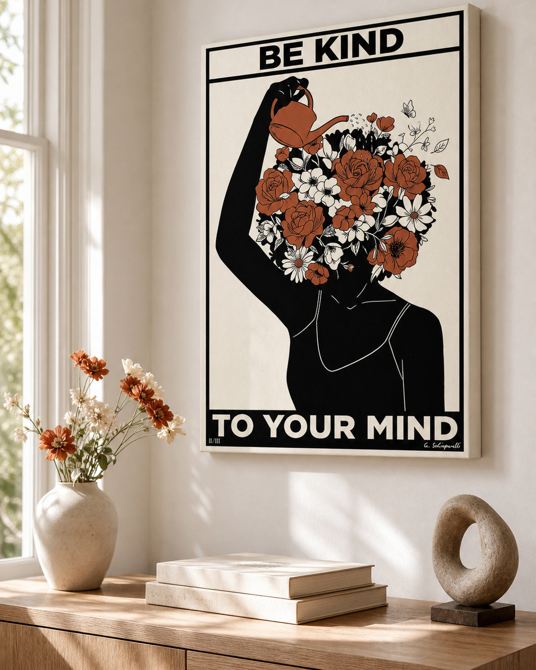 “Be kind to your mind” canvas in a bright interior