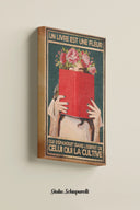 Un libro es una flor que florece en la mente de quien la cultiva 