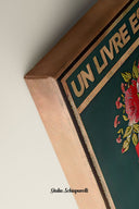 Un libro es una flor que florece en la mente de quien la cultiva 