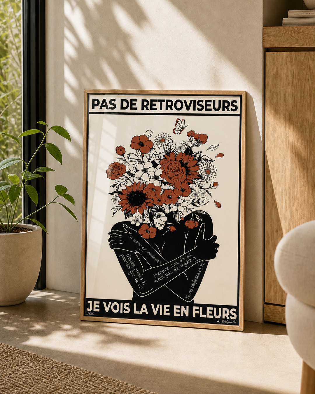 « Pas de rétroviseurs, je vois la vie en fleurs — Atelier » — Art print encadré sous verre, mise en situation 2