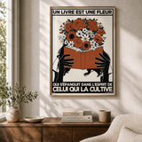 « Un livre est une fleur qui s'épanouit dans l'esprit de celui qui la cultive — Atelier » — Art print encadré sous verre, mise en situation 1